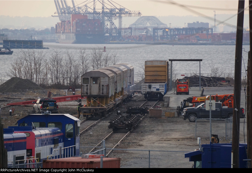 Trucks awaing loading into containers